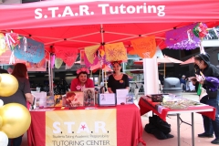 The S.T.A.R. Tutoring Center held its booth before the student union building. They provided stickers and crowns for students and staff to take. Photo credit: Griselda Garcia
