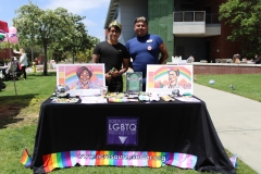 Simón Guzman and José Dieguez joined the Palomar College community to celebrate the Pride Center's 15-year anniversary. Their booth provided resources for the LGBTQ community. Photo credit: Griselda Garcia