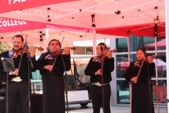 From left to right: Ricardo Arzola, Yalitza Vasquez-Lopez, Carlos Samaniego, and Melisa Diaz performing in front of students, staff, and other attendees. Photo credit: Griselda Garcia