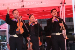 From Left to Right: Carlos Samaniego, Melissa Diaz, and Noel Ayala-Loera sing harmoniously at the Queerceñera fest. Photo credit: Griselda Garcia
