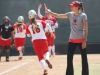 Palomar head softball coach Lacey Craft waves in base runners Carlie Daniel and Paige Falconeiri on Kristina Carbajalâs RBI double in the 3rd inning to put Palomar up 15-0 against Imperial Valley College on April 23 at Palomarâs softball field. The Cometsâ offense scored a season high 25 runs, in part to a combined 5 home runs and 15 RBIâs from outfielder Keilani âKKâ Fronda and third baseman Maci Lerno, and perfect pitching performances from Dani Cowan, Maci Lerno, and Kristina Carbajal. The 25-0 win over the Arabs gave the Cometâs a perfect 18-0 conference record for the first time since 2005. Scott Colson/The Telescope