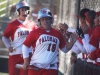 Palomarâs softball team congratulates designated hitter Carlie Daniel and first baseman Paige Falconeri after scoring on catcher Lizzy Hutzlerâs 2-run triple in the 4th inning to put Palomar up 7-1 against Southwestern College on April 16 at Palomarâs softball field. The Comets went on to beat the Jaguars 11-3 to improve their conference record to a perfect 16-0 record with one conference game left. Scott Colson/The Telescope