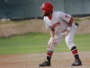 Catcher Francis Christy (#33) leads off of first base after driving in Anthony Fernandez on an RBI single in the 6th inning against College of the Desert on Feb. 20 at Myers Field. The Comets scored 2 runs in the 5th inning and 3 runs in the 6th inning thanks to clutch hitting from Chris Stratton, Francis Christy, and Dillan Smith in their 5-0 win over the Road Runners. Scott Colson/The Telescope