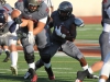 Palomar running back Justin Harris #5 follows blockers for a short gain during the first quarter. Palomar defeated Citrus 35-28 Sept. 6, 2014. Photo: Philip Farry | The Telescope