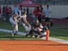 Palomar receiver Damon Nolan #9 lunges to score the first points against the Citrus Owl Defenders Nick Todorovich and Briton Noskoff at the season opener on Sept. 6, 2014. Photo: Casey Cousins | The Telescope