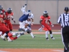 Orange coast college pirate, Robert Murtha #34 is sent flying after being hit by Palomar comets strong safety #47 Stephen Parks. On Chick Embrey field at escondido high school, on Saturday September 28 2013. Image taken at Escondido HS. Escondido Ca. Image taken by Paul Anthony Francis Jr / Telescope