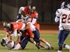 Sept. 28, 2013 | Palomar quarterback Ryan Lamb gets the first down after running over an Orange Coast defense at Wilson Stadium. • Paul A Francis, Jr./Telescope