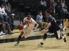 Palomar guard Marley Simmons (3) drives against Bethesda’s Eric King (55) during first half of basketball game of the 9th Annual Palomar College Thanksgiving Tournament on Nov. 29 at The Dome. Simmons had 13 points in the Palomar win, final score Palomar 76 - 70. • Stephen Davis/ Telescope