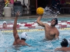 Palomar men's water polo player Evan Dean shoots Grossmont's Collin Stanley provides defense on Oct. 9 in the Wallace Memorial pool. • Xenia Spatacean/Telescope