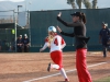 Palomar head softball coach Lacy Craft waves home second baseman Kaylee Hughen after outfielder Keilani âKKâ Fronda broke a 1-1 tie with a 2-run double against Citrus College on Feb 25 at Palomarâs softball field. The Comets picked up their 8th win in a row to improve their record to 9-1 on the season in their 4-1 win over the Owls. Scott Colson/The Telescope