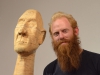 Chris Warr poses with one of his exhibit of Imago at the Boehm Gallery opening March 6 2014/Lucy Wheeler_Telescope