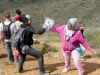 Clariz Calimag and Yalda Sidiqi celebrate a job well done with an explosive, powdery high-five.