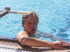 Daniel Hartl of Palomar College's men's swim team catches his breath after winning 1000 yard free event, consisting of swimming 40 lengths of the pool, in the match against Grossmont College March 14, 2014. Lucas Spenser/Telescope 2014.