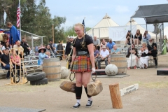 Norwegian strongwoman, Hanne Gausland walks around a distance marker during a strength competition at the Vista Viking Festival on Sept. 21, 2025. Competitors had to carry two 150 pound stones as far as they were able, Gausland won the event after walking 120 feet. Photo credit: Tanner Hayes