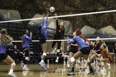 Palomar College's Teiora Tinoisamoa (#6) spike the ball past San Bernardino Valley College's Destiny Allen (#11), with Palomar's Emma Bambe (#12) and Kiana Merrill (#3) waiting for a short return on Sept. 10, 2025, at The Dome.