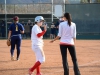 February 11, 2015 | After a successful rundown a.k.a. a "pickle" situation, Coach Lacey Craft high fives her player Kali Pugh#23. Seth Jones / The Telescope