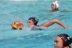 Tessa Ferragamo (#15) dribbles the ball to the other side of the pool in the first quarter of the Comets second game against Mt.San Antonio of the Women's Water Polo mini tournament on Sept. 5, 2025. Ferragamo scored the first goal in the second game in the first minute of play. Photo credit: Griselda Garcia