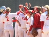 Palomarâs softball team congratulate first baseman Page Falconeiri at home plate after hitting a 3-run home run in the first inning to put Palomar up 3-0 in the 1st inning against San Bernandino Valley College in game 1 of the Southern California Regional softball playoffs on May 3 at Palomarâs softball field. Falconeiri went 2-3 with 2 home runs and 6 RBIâs in the Cometsâ 15-0 win over the Wolverines. Palomar went on to sweep San Bernandino Valley in 2 games. Scott Colson/The Telescope