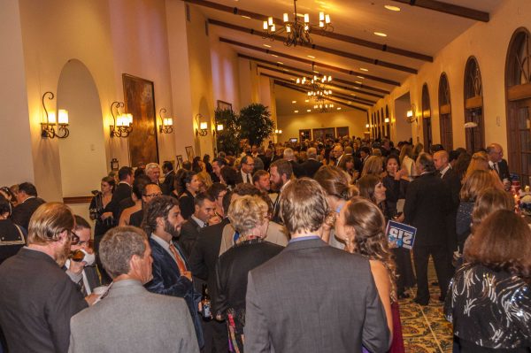 November 16, 2013. Guests of the Palomar College President's Association's Palomar's Star Spangled Salute to Education event peruse the donated artwork and enjoy cocktails duringthe silent auction this Saturday night. (Lucas Spenser/The Telescope)