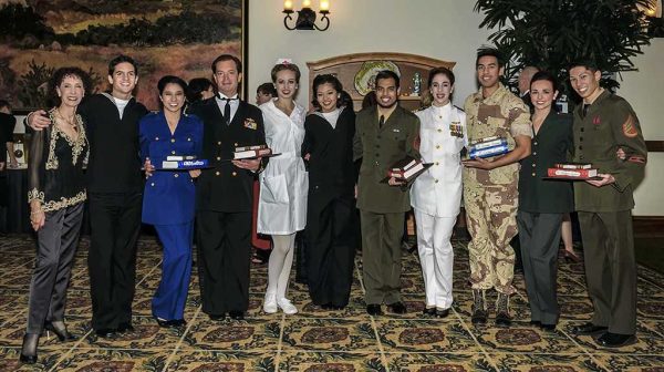 Nov. 16, 2013 | Sue Gilson (l), director at Palomar College Performing Arts, with the students that performed at Palomar's Salute to Education gala event that was held at La Costa Resort and Spa, Carlsbad, Calif. (Francois Swart/The Telescope)