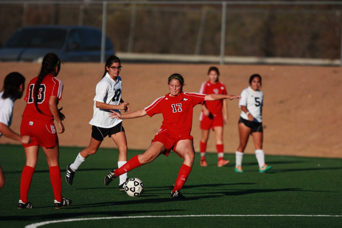 Nov. 8, 2013 | Midfielder Viviana Meza (17) kicks the ball in to opponent's territory in a women's soccer game against Imperial Valley College at Minkhoff Field. The Comets pulled off an impressive 4-0 win against The Arabs. (Scott Colson/The Telescope)