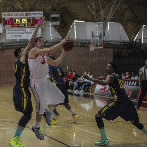 Palomar’s Travis Stevens (33) scores during first period action of the third-place game of the 9th Annual Palomar Thanksgiving Tournament at The Dome. (Stephen Davis/The Telescope)