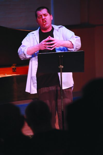 Robert Giracello performing a piece that he wrote entitled "Songs of Love and Death" at the Feb. 13, 2014 Concert Hour. (Stephen Davis/The Telescope)