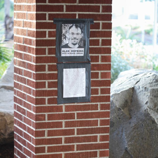 A memorial sits in the rock garden next to the Howard Brubeck Theatre dedicated to Alan Hopkins who was killed Sunday, Jan 26, 2014. Hopkins was a faculty member in the Performing Arts Department. He was currently Property Master for The Glass Menagerie play and Assistant Scenic Designer for the musical production of Cabaret. (Stephen Davis/The Telescope)