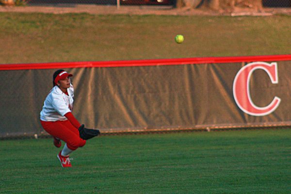 Centerfielder Keilani “KK” Fronda (#11) makes a diving catch to end the game against Saddleback College on Jan. 29, 2014 at Palomar’s softball field. Fronda’s stellar defense contributed to the Comets’ season opening 7-5 win over the Gauchos. (Scott Colson/The Telescope)