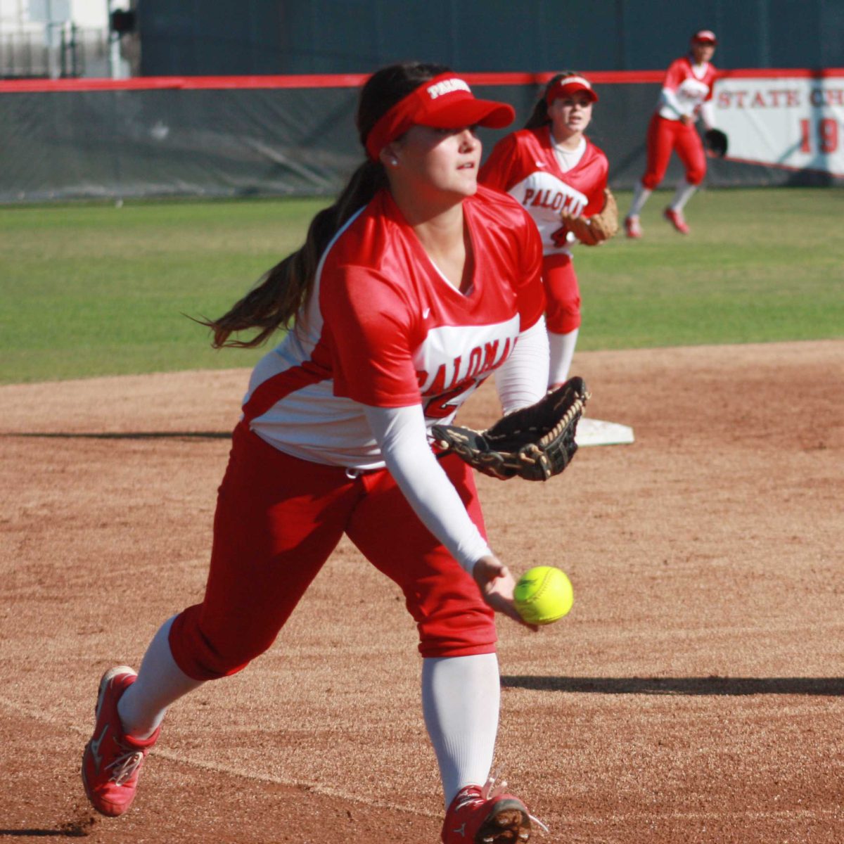 Palomar shortstop Kali Pugh gets the force out at third base to end the first inning against Citrus College on Feb. 25, 2014 at Palomar’s softball field. The Comets picked up their 8th win in a row to improve their record to 9-1 on the season in their 4-1 win over the Owls. (Scott Colson/The Telescope)