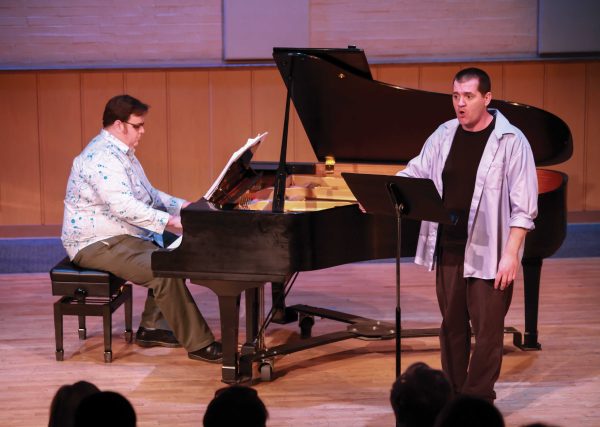 Robert Giracello (r) accompanied by Chad Ohlheiser on piano performs "Songs of Love and Death" at the Feb. 13, 2014 Concert Hour. (Stephen Davis/The Telescope)