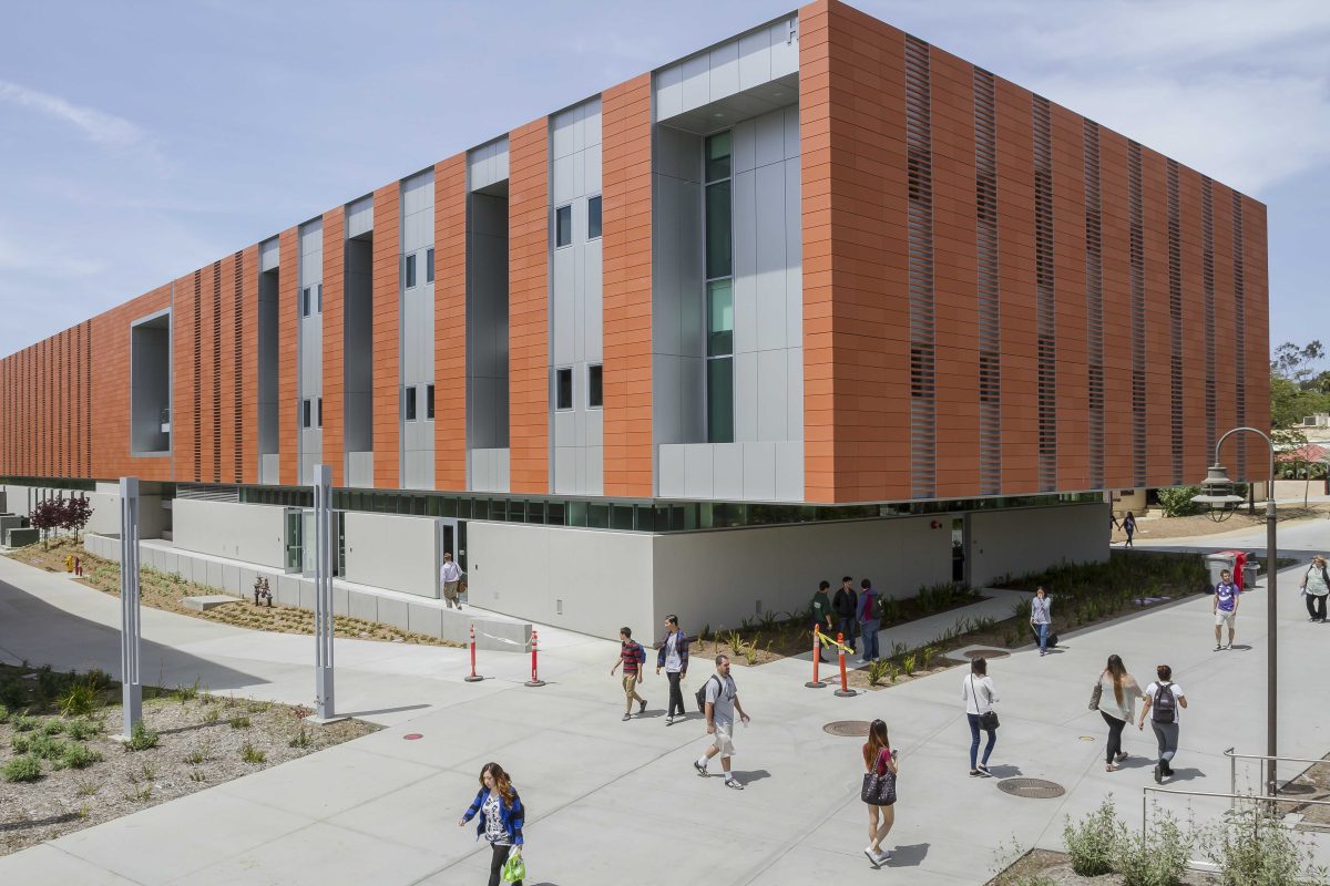 Students walk by the new Humanities building on the San Marcos campus on April 23, 2014. (Steve Porter/The Telescope)