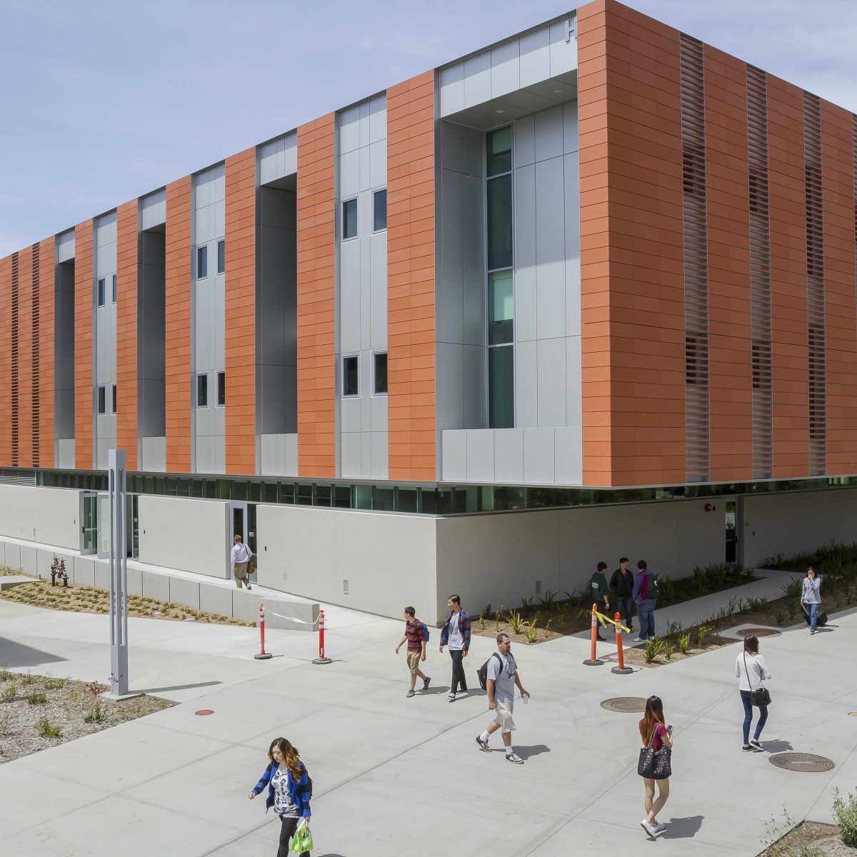 Students walk by the new Humanities building on the San Marcos campus on April 23, 2014. (Steve Porter/The Telescope)