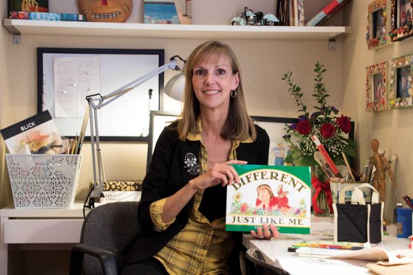 Palomar College Faulty Member Lori Mitchell is the author and illustrator of the children’s book, Different Just Like Me. (Yolanda Granados/The Telescope)