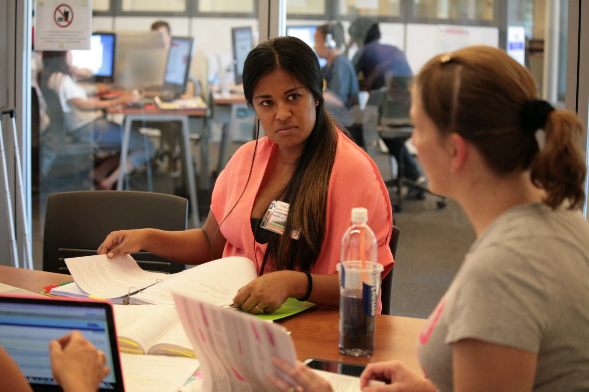 Paula Pama listens as her fellow nursing student Erin Stone quizes the group on their current study subject in the new Teaching and Learning Center at Palomar College San Marcos Campus on Sept. 15, 2014.