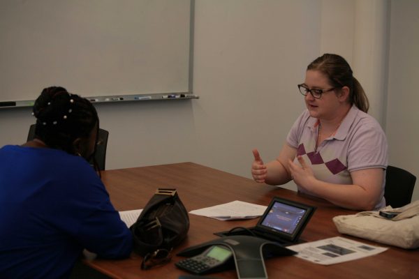 Tutor Lori Gomez has office hours in the TLC building for Englishd 50 and Student Maria Taylor stopped by for some help on her paper. (Telescope Staff/Thte Telescope)