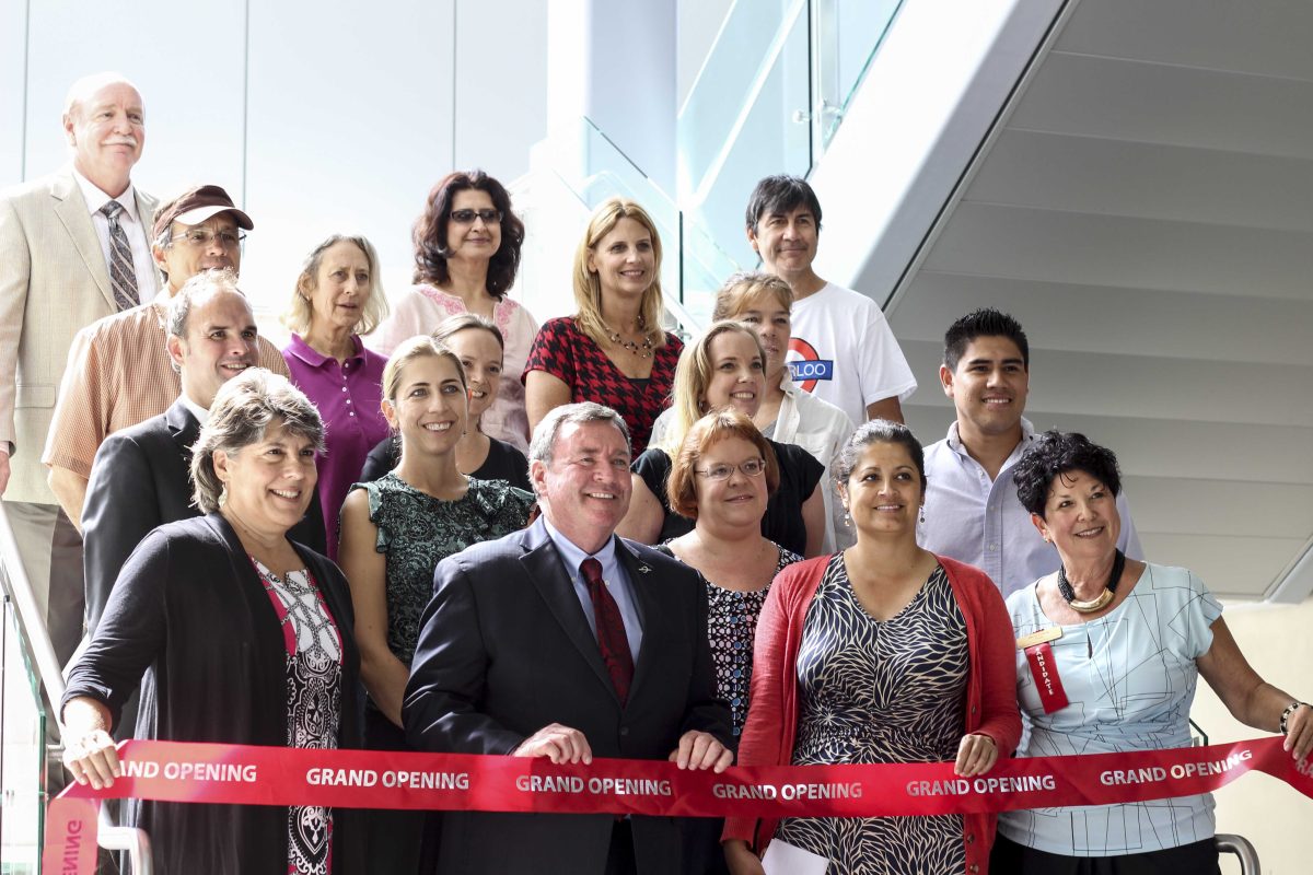 President Deegan posing with Palomar staff before the ribbon cutting ceremony at the Grand Opening of Palomar’s new building on Oct. 10, 2014. (Gerald Tovar/The Telescope)