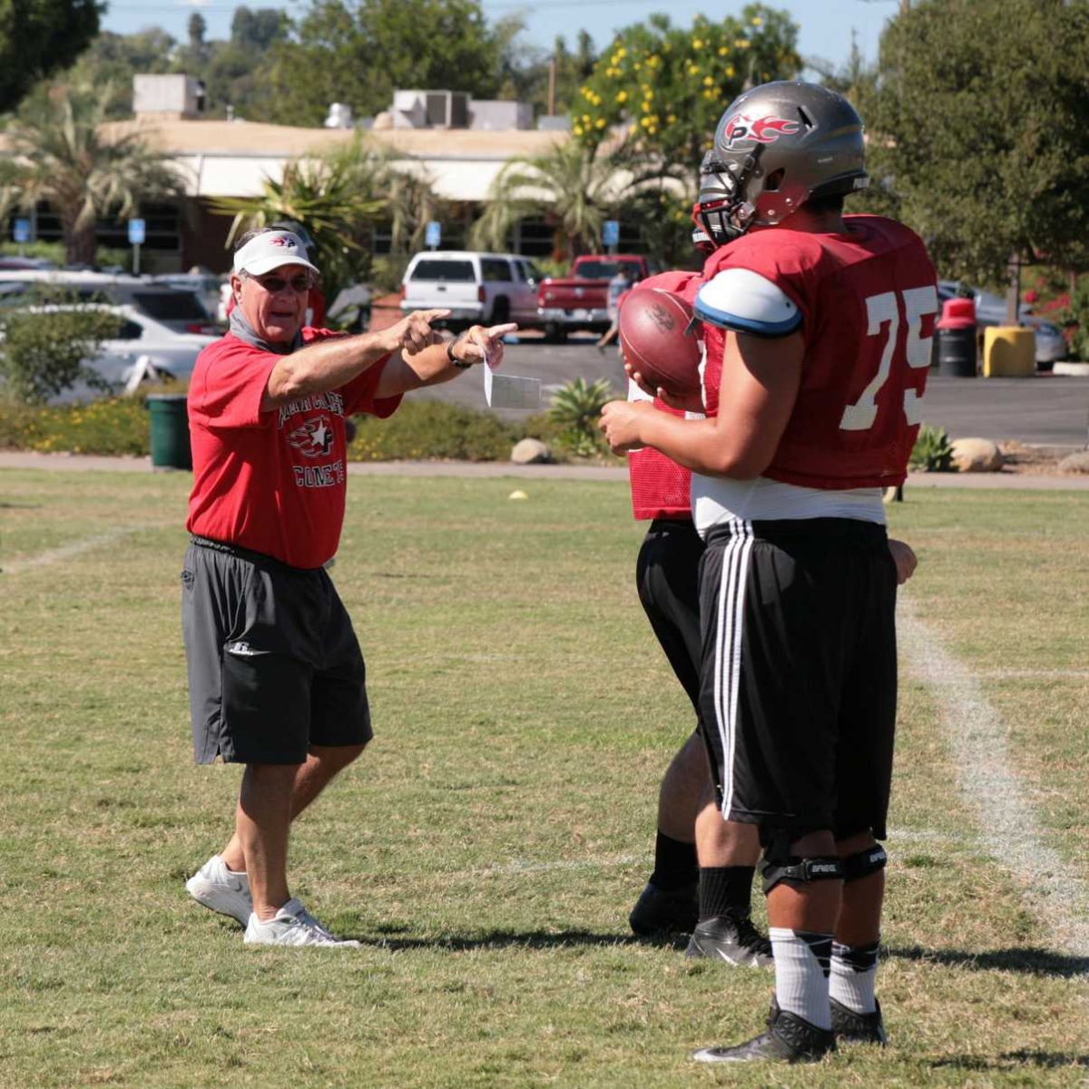 Quarterback Coach Bill Diedrick working with one of his Comets. (Telescope Staff/The Telescope)