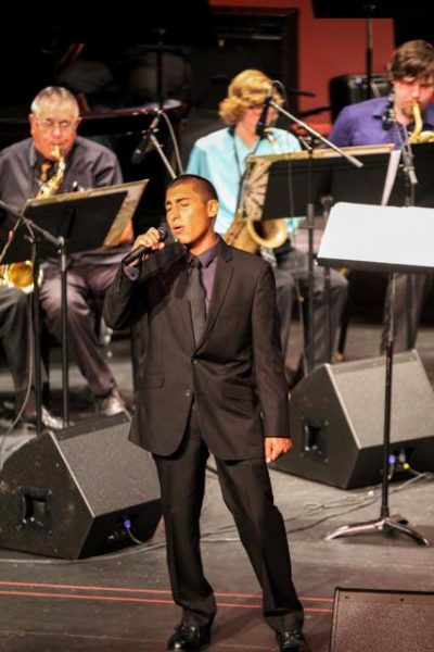 Victor Renteria sings “Fly Me To The Moon” during “Big Swing Face: A Tribute to Buddy Rich” which was performed by the Palomar Jazz Ensembles at the Howard Brubeck Theatre Palomar College, San Marcos on Sept. 26, 2014. (Philip Farry/The Telescope)