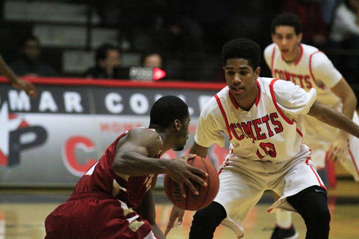 Nov. 30, 2013 San Marcos, Calif. l Guard Braxton Smith (#10) covers his opponent from Southwestern College. (Scott Colson/The Telescope)