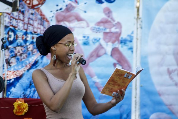 Sherehe Yamaisha Roze performs selections from her book, Heart Love Messages of the Soul, Nov. 5, 2014. (Angela Marie Samora/The Telescope)