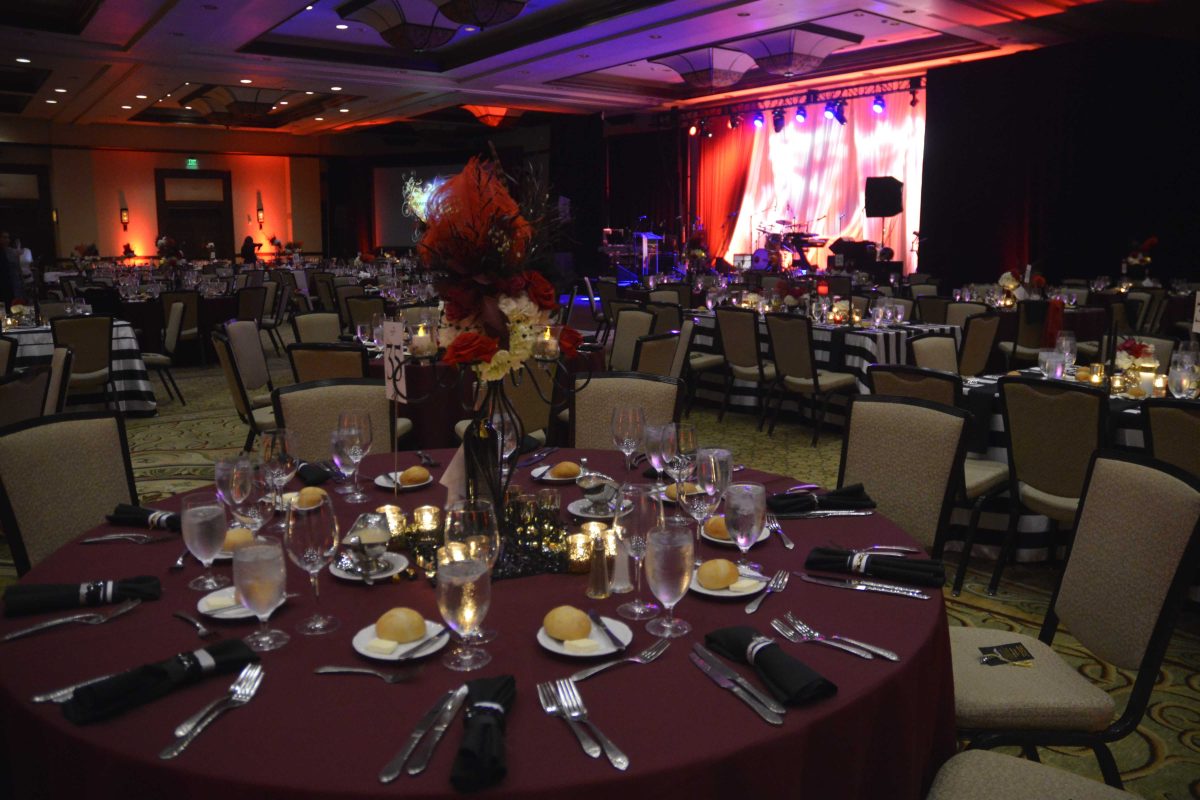 Workers put on the finishing touches in the ballroom before the beginning of Palomar College President's Associates 24th Annual Gala at the Omni La Costa Resort & Spa on Saturday, Sept 12, 2015. (Justin Gray/The Telescope)