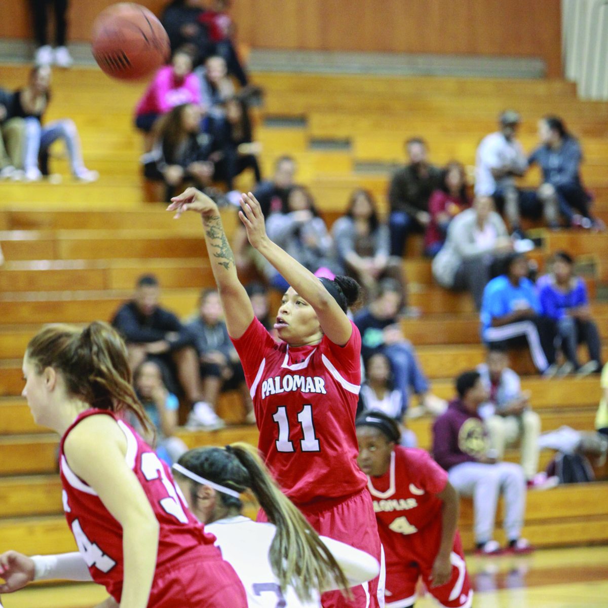 Palomar's Keisha Cox (11) shoots freethrows during the second half of the Jan. 7, 2015 game versus Southwestern College. Cox had 16 points in The Comets' 76-68 win. (Stephen Davis/The Telescope)