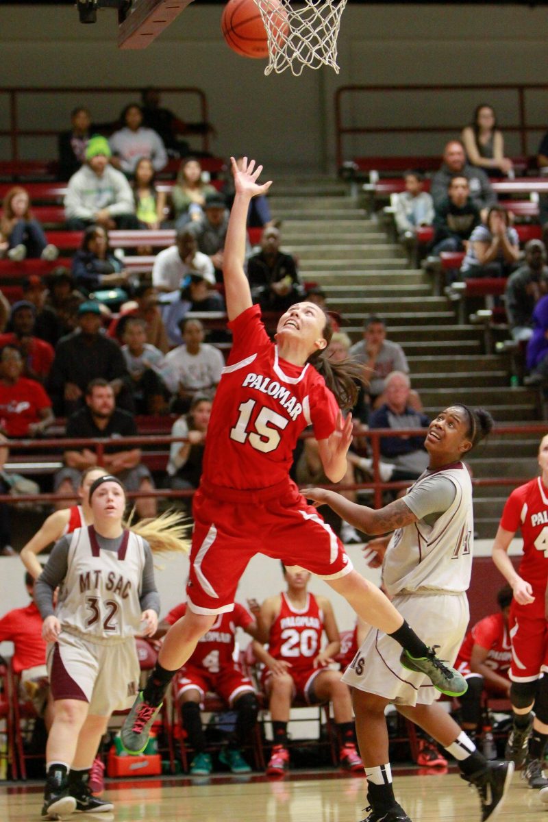 Palomar's Melissa Allen scores on this drive to the basket during the March 7, 2015 game versus Mt. San Antonio College. Allen was the second high scorer for The Comet's with 8 points; she also had 3 rebounds and 1 assist. The Comets lost the round four game of the CCCAA Southern Regional Championships to Mt. SAC 60-54. Mt. SAC moves on to play the winner of the Northern California Regional playoffs for the state championship on March 14 at Cerritos College. (Stephen Davis/The Telescope)