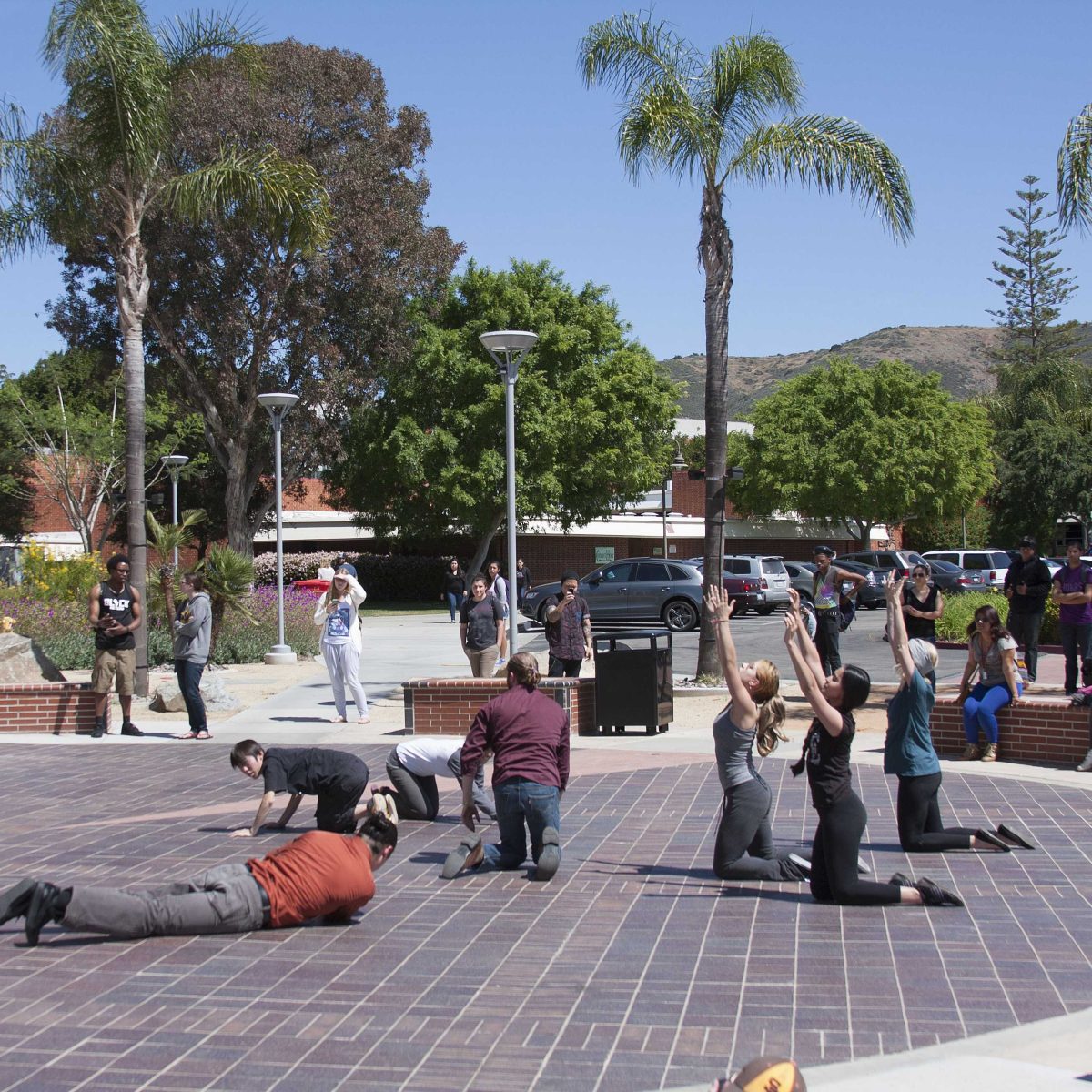 Students perform an interpretative dance flashmob outside the Howard Brubeck Theater on March 26. The student-produced flashmob was held to celebrate art as a form of social protest in observance of Women's History Month. (Claudia Rodriguez/The Telescope)