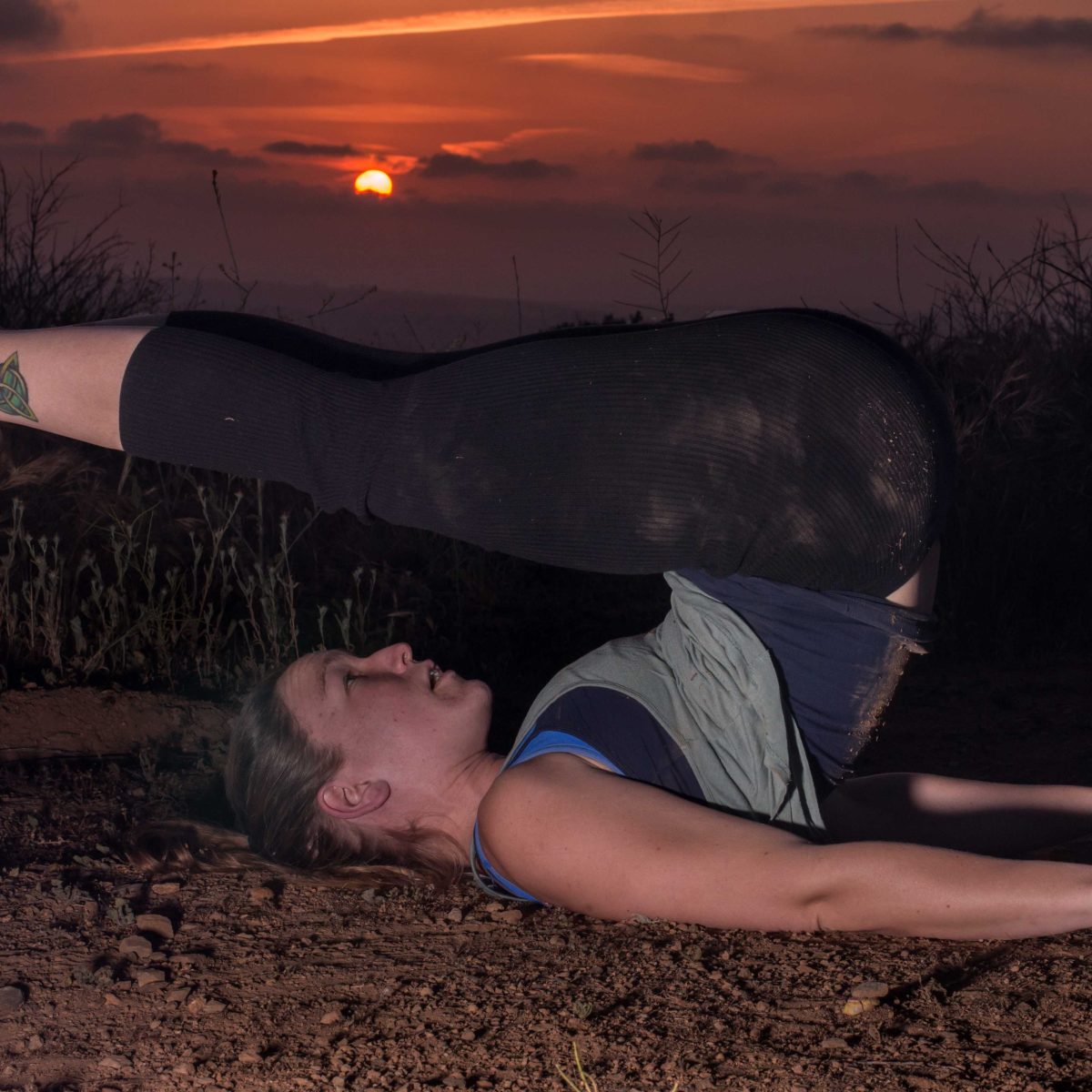 Susan Whaley demonstrates the mid form yoga pose of The Plow. (Belen Laad/The Telescope)