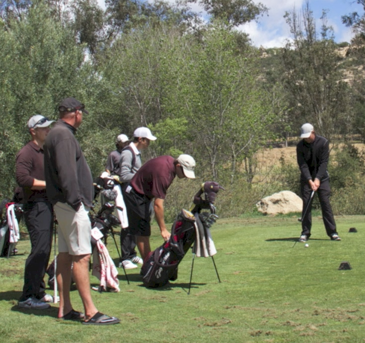 A group of male Palomar golfers play golf on a sunny day.