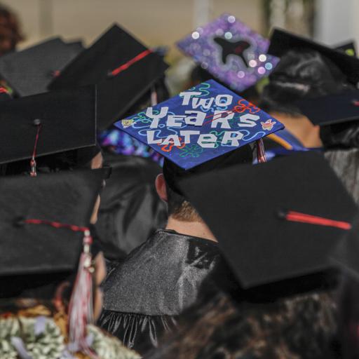 Palomar students listen to guest speakers during Commencement Ceremony held Saturday May 16, 2015 at the San Marcos campus. (Philip Farry/The Telescope)