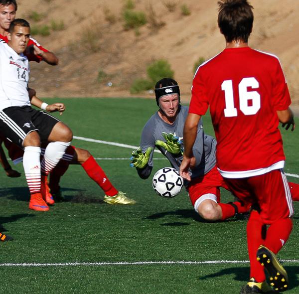 Palomar goalie Autry Hailey dives to catch a Santa Ana corner kick during the second half against visiting Santa Ana College. The Dons beat the Comets 4-0 at Minkoff Field on Aug. 27, 2015. (Philip Farry/The Telescope)