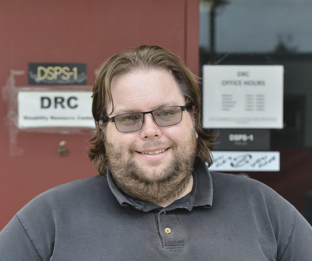 Aaron Holmes is the Alternative Media Specialist for the Disability Resource Center at Palomar College, Sept. 21, 2015. Through the media center text books and class materials can be convert to assist those with disabilities, such as hearing, visual or motor disabilities. (Brandy Sebastian/The Telescope)